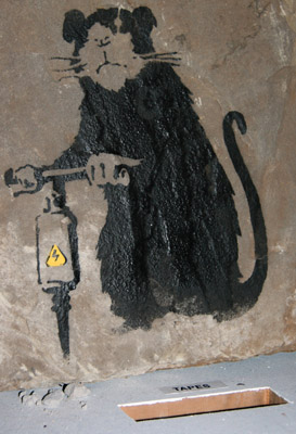 Banksy drilling rat