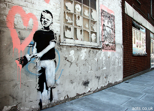 Banksy - Graffiti boy with Pink Heart