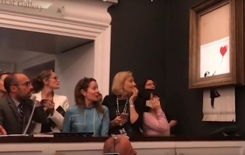 Photo of Banlsy painting shredding at Sotheby's