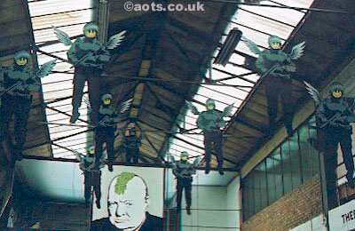 Banksy - flying coppers at Turf War