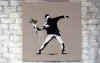 banksy_barely_legal_thrower.jpg (23977 bytes)