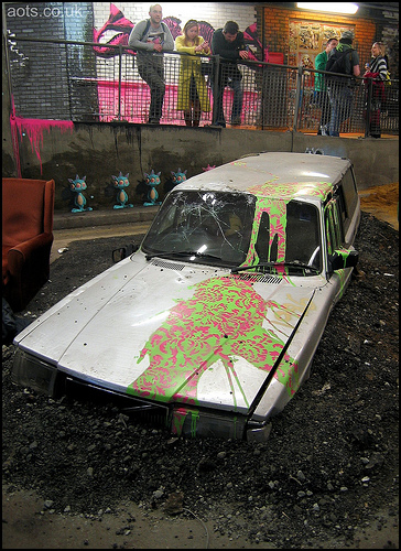 Banksy submerged car at the Cans Festival