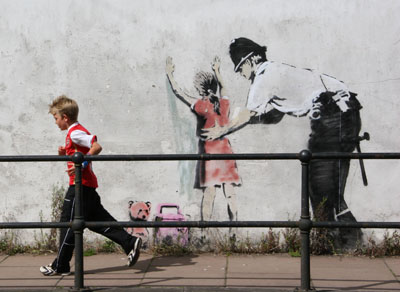 Banksy Police stop and search girl, Glastonbury