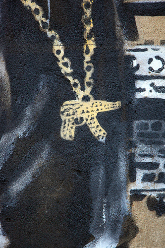 Banksy gun on chain