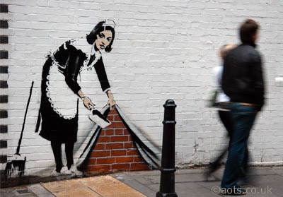 Banksy Sweeping It Under The Carpet