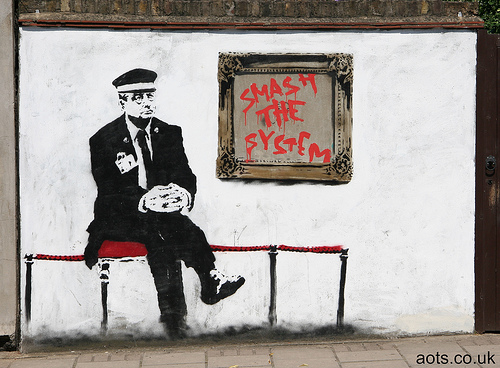 Banksy Smash the System