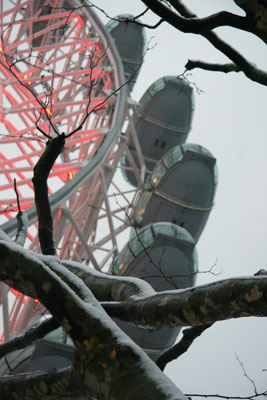 London Eye with snow covered tree