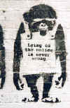 Banksy Lying Monkey