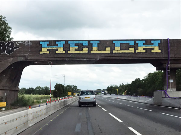 Photo of Helch graffiti on the M1