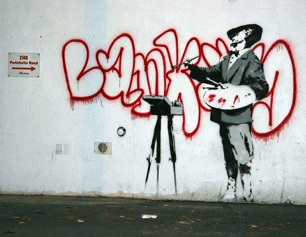 Banksy graffiti artist painter in Ladbroke Grove