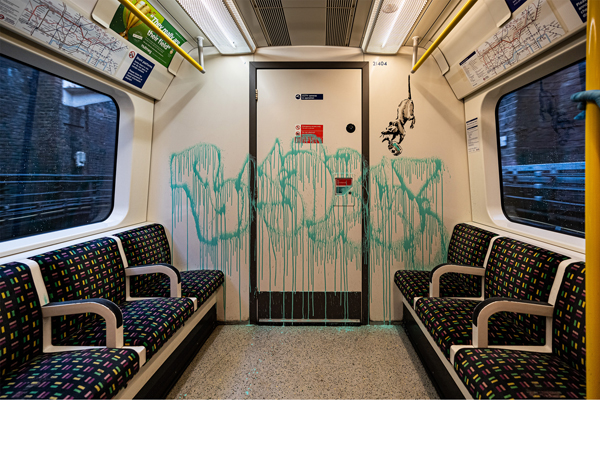 Banksy tube graffiti