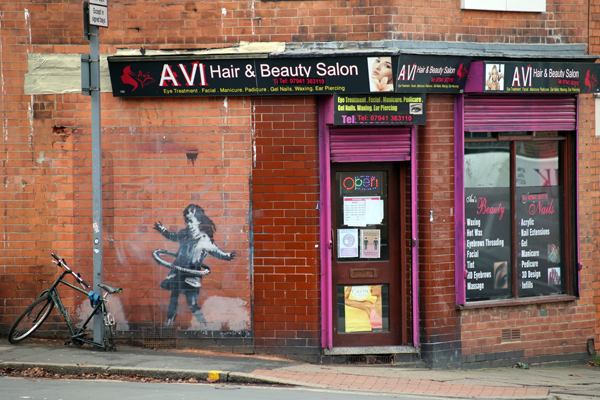 Banksy - Hula girl Nottingham with replacement bike
