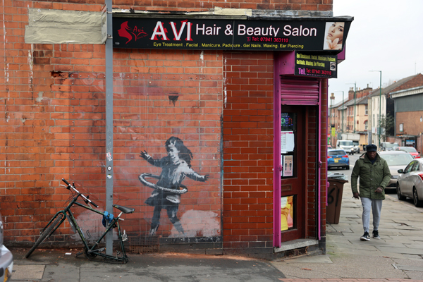 Banksy - Hula girl Nottingham with replacement bike