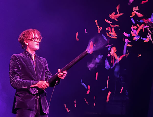 Jarvis Cocker firing the confetti cannon