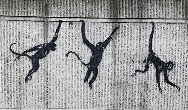 Detail of the Banksy's monkey on Brick Lane