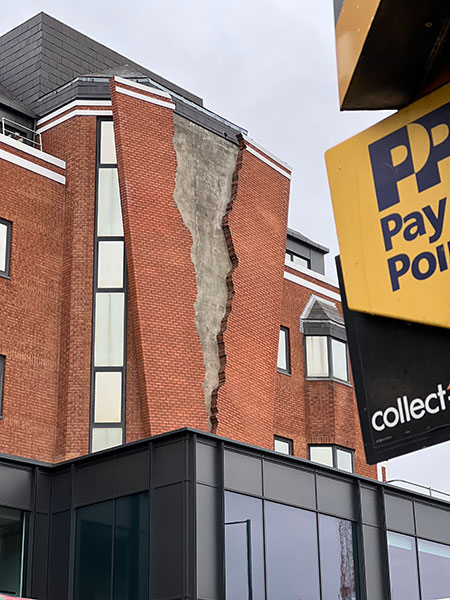 Alex Chinneck - 'Six Pins and a Half Dozen Needles' in Hammersmith
