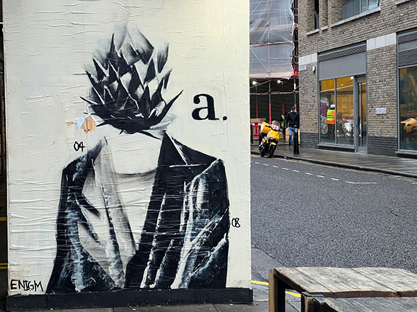 Enigm flower head figure in Shoreditch