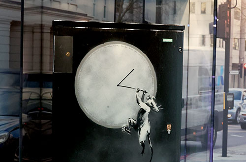 Banksy artwork on a TFL junction box, now on display in the London Transport Museum