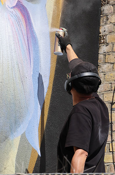 Curtis Hylton at work on his piece up high in the centre of Kingsto