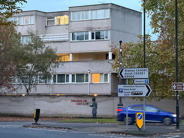 DNZ God Save The Kingdom street art on the Ward Royal Estate, Charles Street, in Windsor